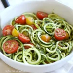 Raw Spiralized Zucchini Noodles with Tomatoes and Pesto